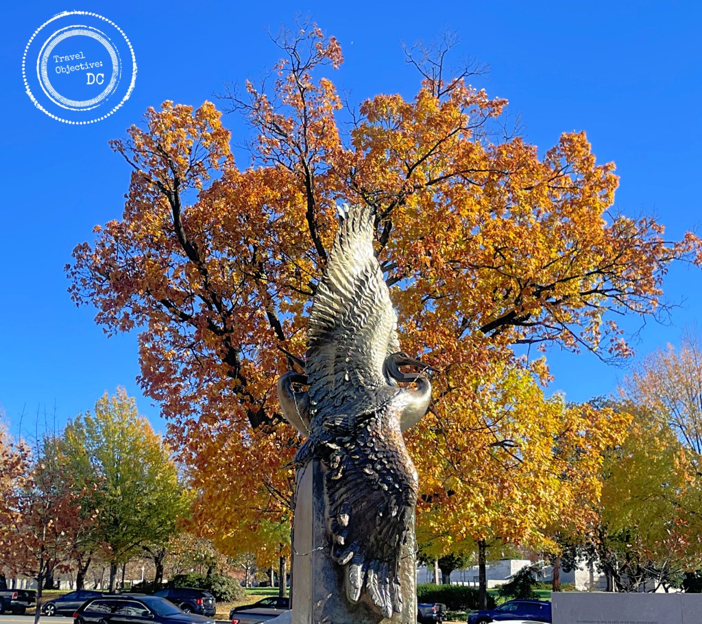 The Cranes Sculpture shines in the sun on a brilliant autumn afternoon.