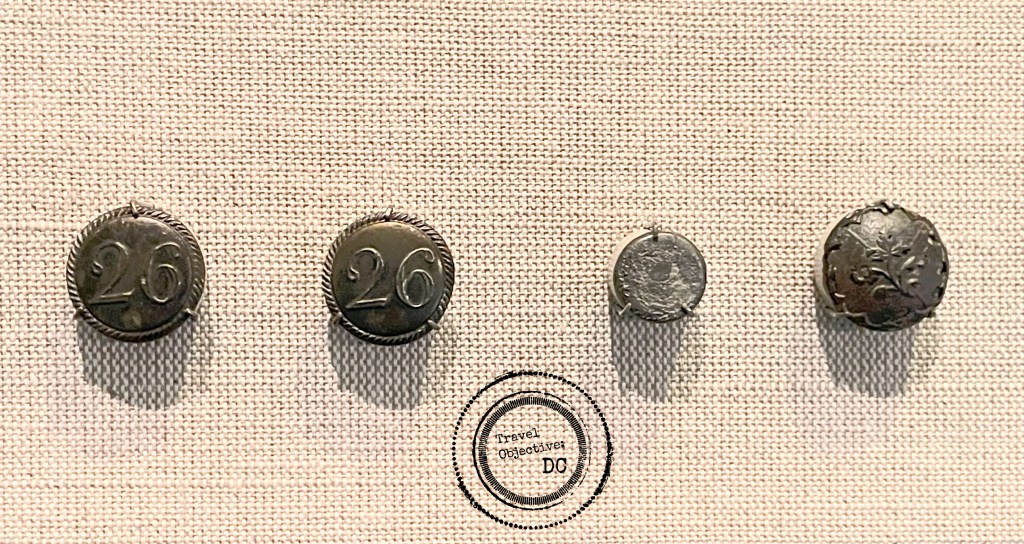 Pewter buttons from uniforms recovered from the Gunboat Philadelphia.
